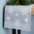 Transform your holiday dining experience with this Embroidered Snowflake Table Runner. Designed with delicate snowflakes...