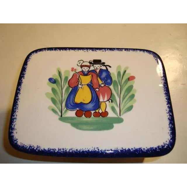 A very nice French faience/ earthenware box with its lid made by Pornic, France. This piece was hand-painted by the artist...