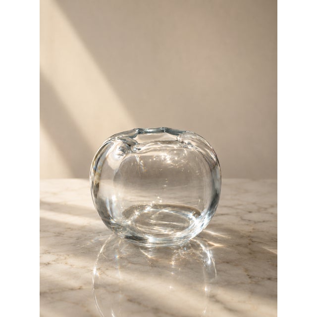This refined Swedish crystal vase, part of the famous "Stella Polaris" series (also known as the Orion series), is a...