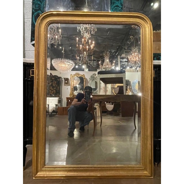 The 19th c. French Louis Philippe Giltwood Mirror is a stunning piece with a beautiful line pattern and a beaded inner...