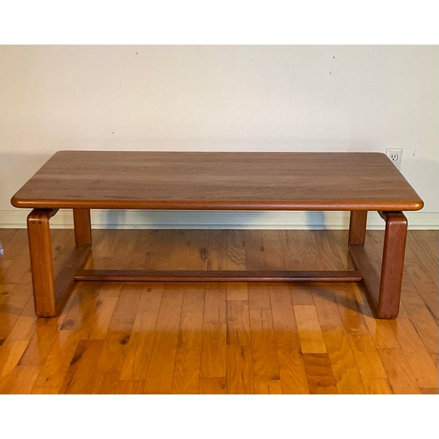 Solid walnut and veneers rectangular coffee table with a Scandinavian feel, circa 1980s. K. D. Furniture Manufactured by...