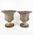 Enhance your outdoor living space or grand entryway with this exceptional pair of vintage cast stone urns. these planters...
