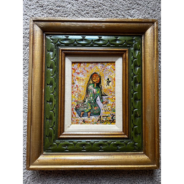Vintage, mid century oil painting on wood panel of a woman with long hair. Signed to the lower right. In vintage ornate...