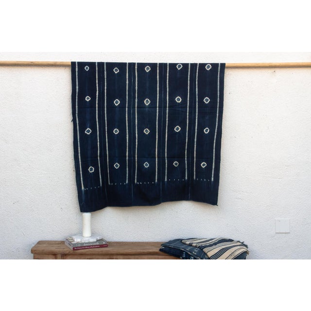 Hand-woven by master weavers of the Mossi and Dioula traditions in Burkina Faso, West Africa, these vintage textiles are...