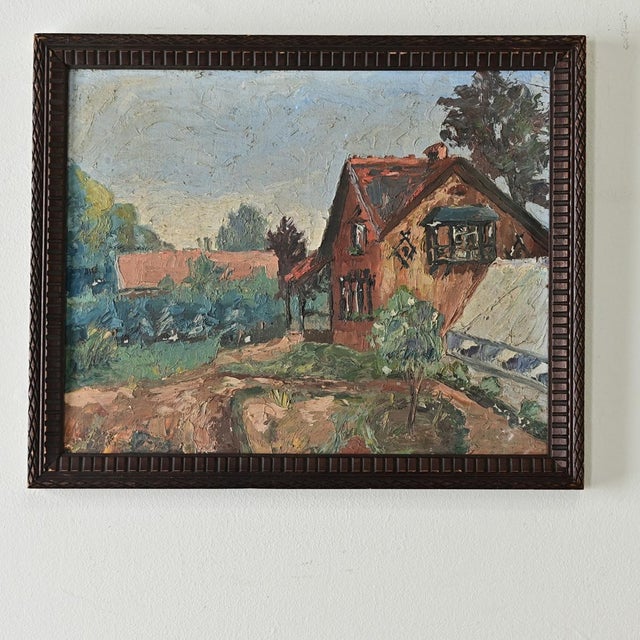 This French vintage 20th century oil on board painting illustrates a modest homestead in a rustic, country landscape....