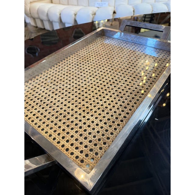 Elegant Italian mid-century serving tray crafted in the 1970s, featuring a sleek polished chrome frame with integrated...