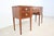 Elegant Kindel mahogany sideboard crafted in the Federal style, featuring satinwood inlay, classic brass ring pulls, and...