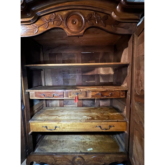 This exquisite armoire was purchased from Chateau Cormatin in 1910. It features walnut construction containing two heavily...