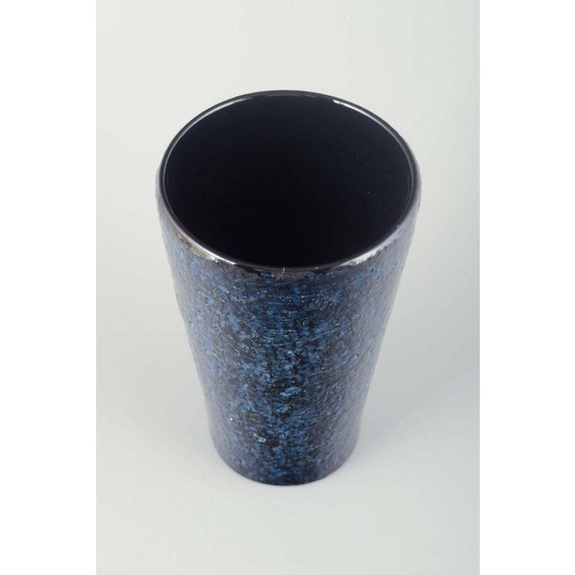 Ingrid Atterberg for Upsala-Ekeby Ceramic vase, model 2456, 1960s. Cylindrical stoneware vase with deep dark blue glaze...