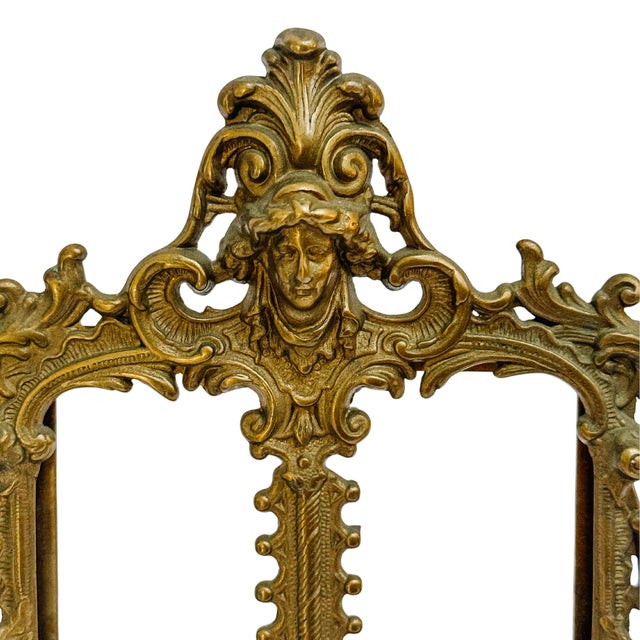 A Belle Époque antique double picture frame, hand-sourced in Paris. Exemplifying the fluid artistry of the Art Nouveau...