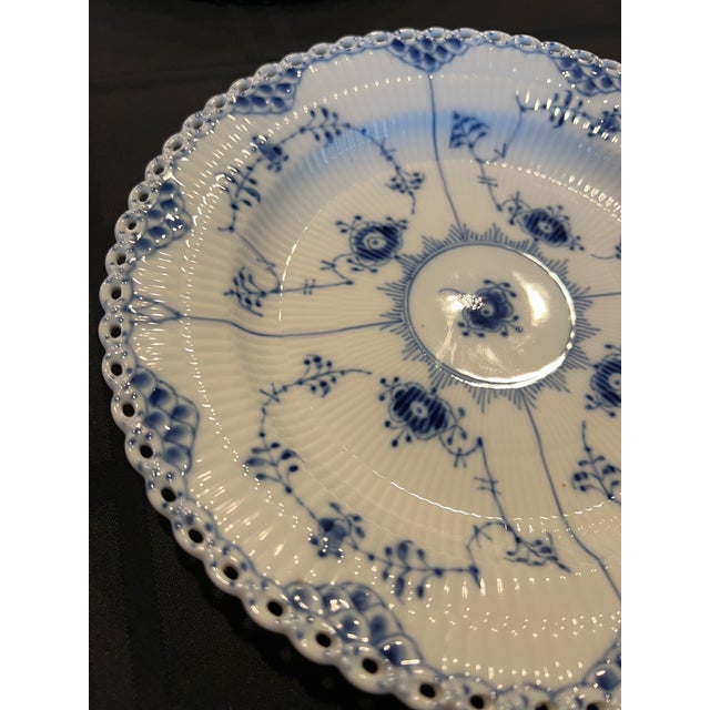 Authentic Royal Copenhagen Blue Fluted Full Lace porcelain place setting, Denmark. The most ornate expression of the...
