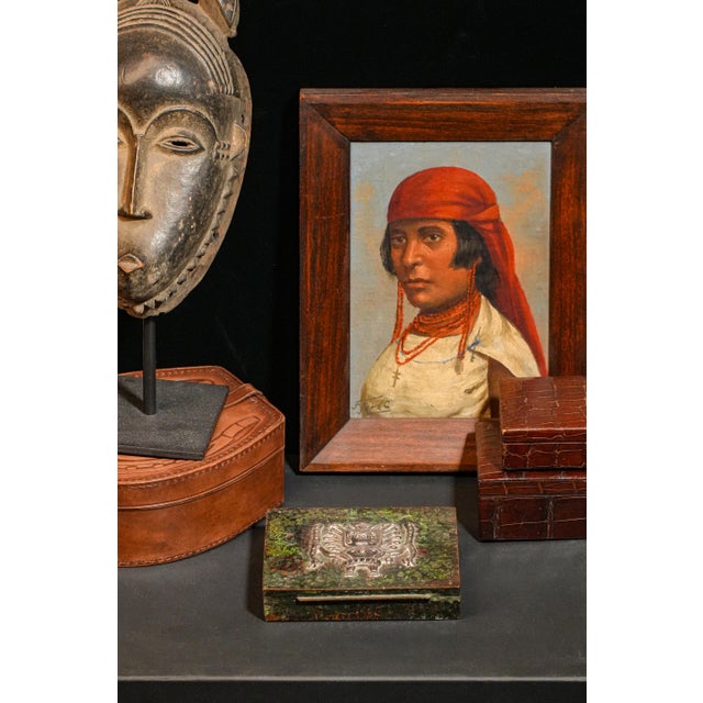 Add a touch of history and artistry to your collection with this stunning handmade mixed-metal trinket box, a masterpiece...