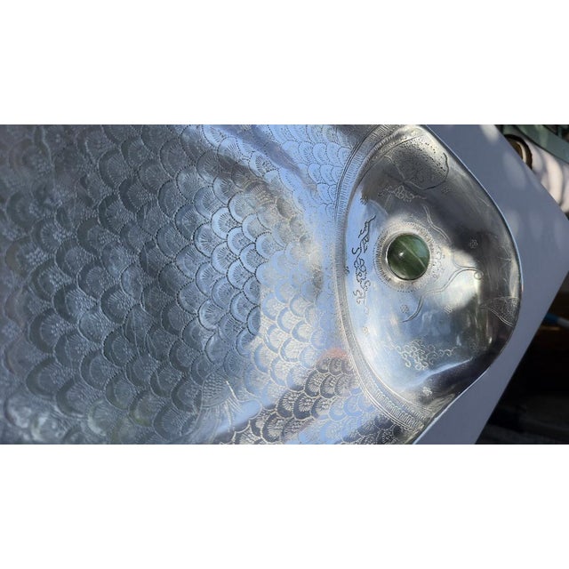 Vintage 1975 Arthur Court Designs fish platter, made of sand-cast aluminum with a natural green agate-style stone eye. A...