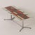 Mid-Century coffee table with ceramic tile table top made at Denisco, Belgium ca. 1960s. The frame/base is made of chrome-...