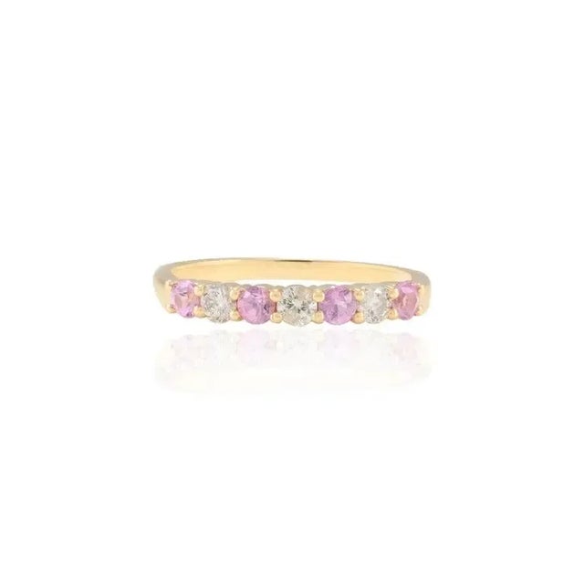 Pink Sapphire and Diamond Stackable Band Ring in 14K Gold symbolizes the everlasting love between a couple. It shows the...