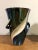 Ceramic vase from the late 50s. Color black and pearly white. This piece has an attribution mark, I am sure that it is...