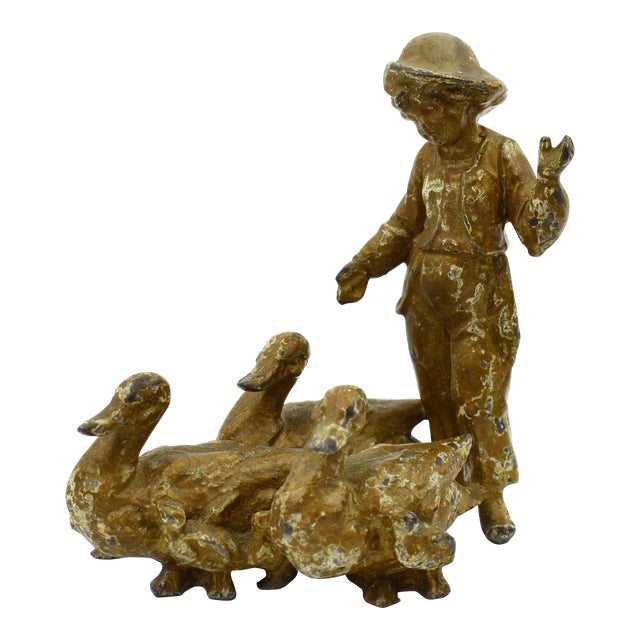 Early 20th Century Cast Metal Boy With 3 Ducks Figurines For Sale
