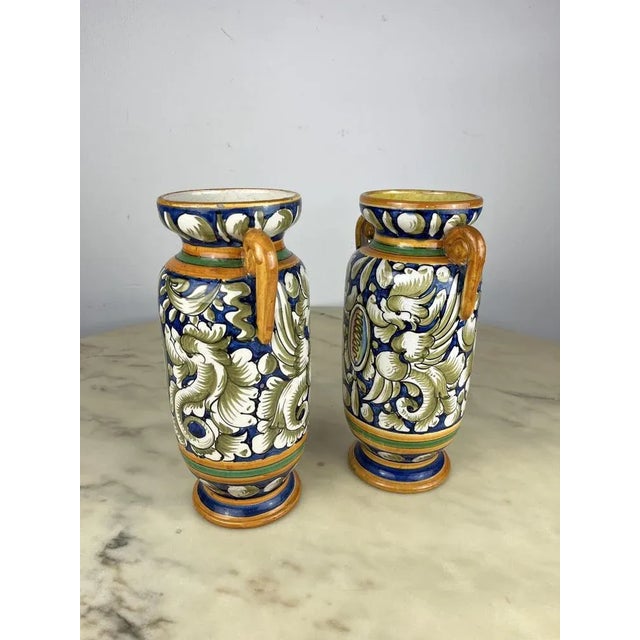 Pair of ceramic amphorae of Caltagirone, painted and handmade, 80s Purchased by my grandparents, they are 30 cm high....