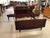 Stunning rosewood French Art Deco bedroom suite. Comprised of a bed, matching pair of night stands and, a matching...