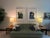 Custom sofa upholstered in a refined muted sage green fabric by Zimmer + Rohde, with subtle tonal variation, commissioned...