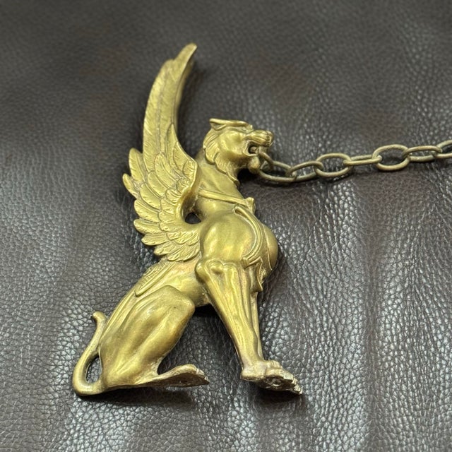 Hang these two magnificent and fearsome winged griffins to guard your house and to elevate the look of your walls. Age is...