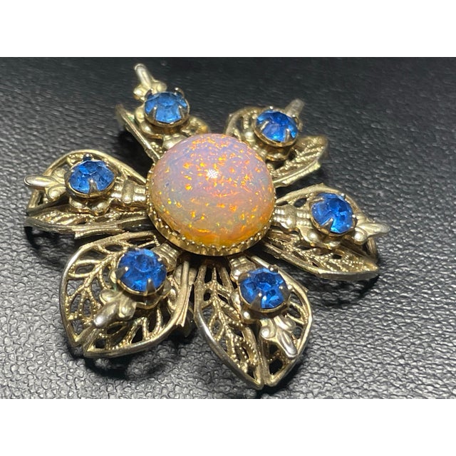 MCM stamped filigree frame and a distinct Bohemian art glass center. While often casually labeled as "Dragon's Breath" by...