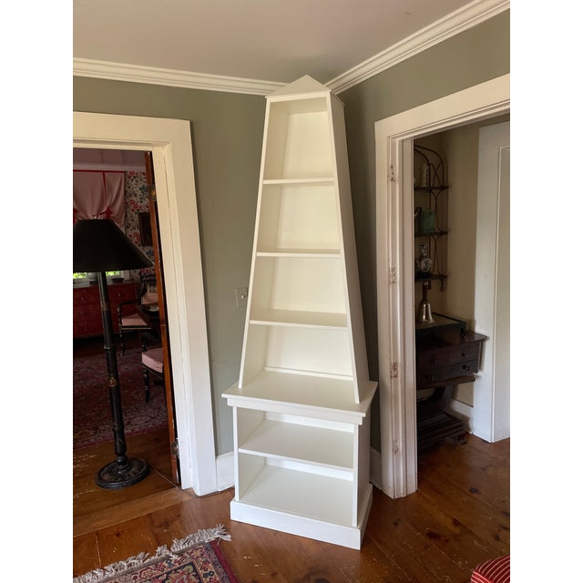 Irwin and Lane’s famous obelisk bookcase is back but this time with a pyramid top. Or as my four year old daughter says, “...