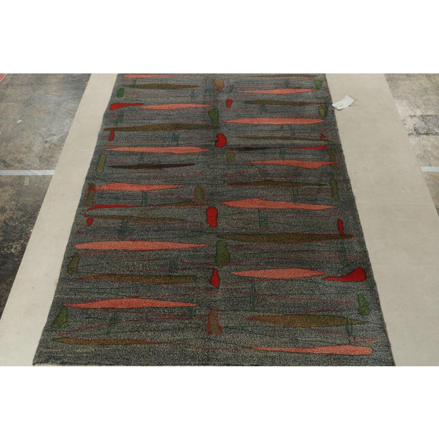Hand-knotted in Turkey originating between 1960-1970, this vintage mid-century modern rug is the latest to join our...