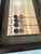 This 13-foot long shuffleboard table by District Eight is a unique combination of quality materials and skilled...