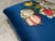 Vintage Floral Upholstered Footstool on Brass Ball Casters For Sale - Image 12 of 13