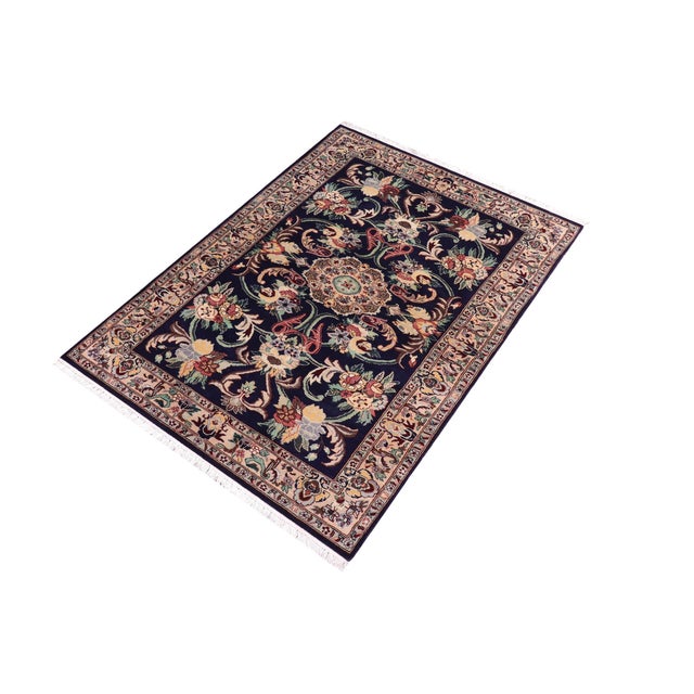 Designed with mesmerizing intricacy and gorgeous color palette, this hand-knotted masterpiece demonstrates the beauty and...