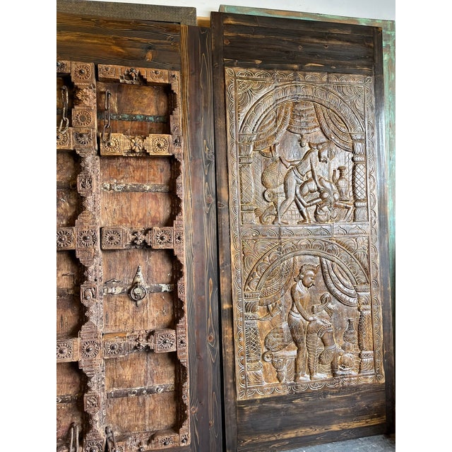 Add an extraordinary statement piece to your home with this hand-carved vintage barn door panel, featuring intricate...