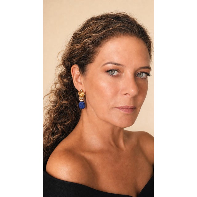 A dramatic pair of Italian drop earrings dating to circa 1980, crafted in 18K yellow gold with carved lapis lazuli, carved...