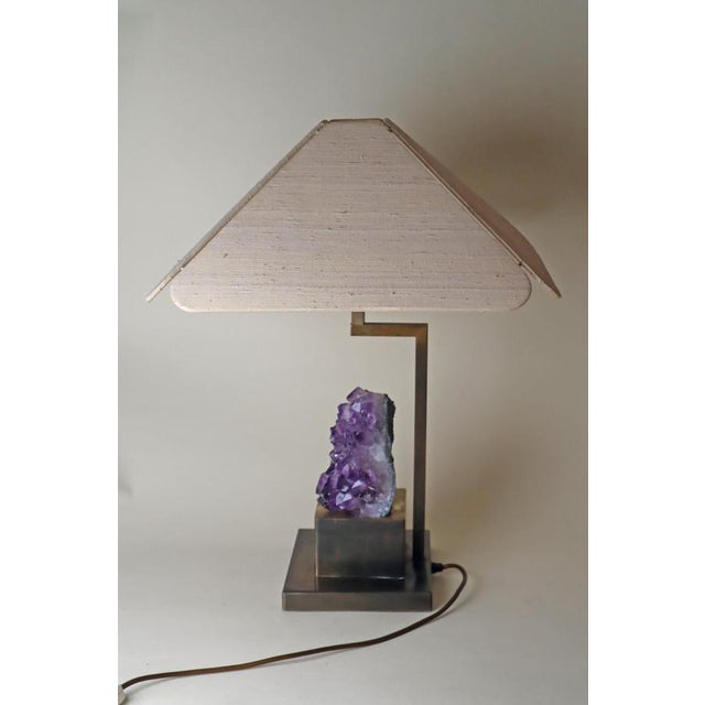 This beautiful table lamp is a one-of-a-kind designer piece. The special feature is that the large, beautiful dark purple...