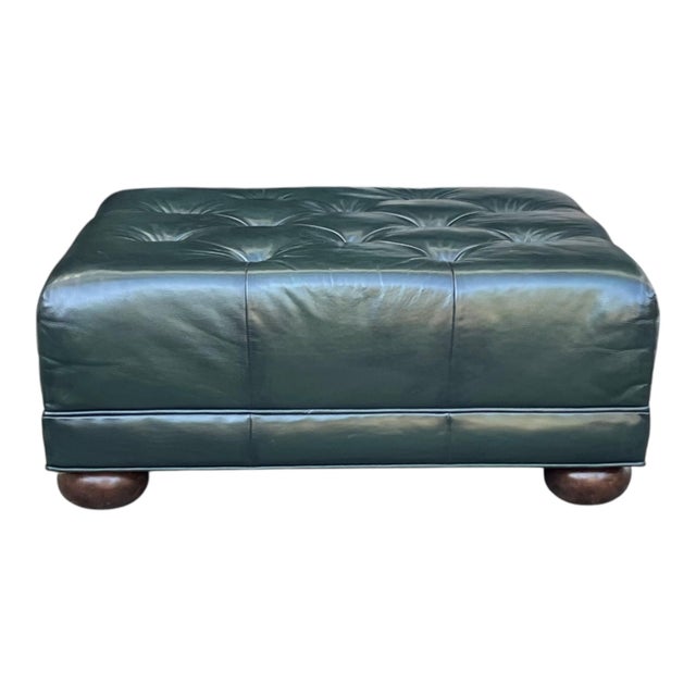 This versatile vintage leather ottoman effortlessly doubles as a coffee table, blending functionality with timeless...