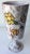 Handcrafted, hand painted French midcentury ceramic vase. Beautifully decorated with floral designs and glazed. Signed on...