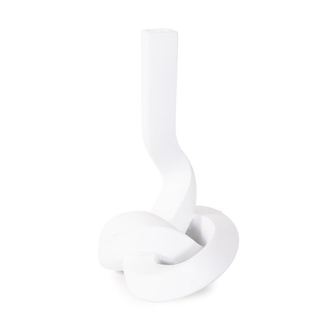 This sculpture is a study in the art of distortion and balance, expertly crafted to leave a lasting impression. Its...