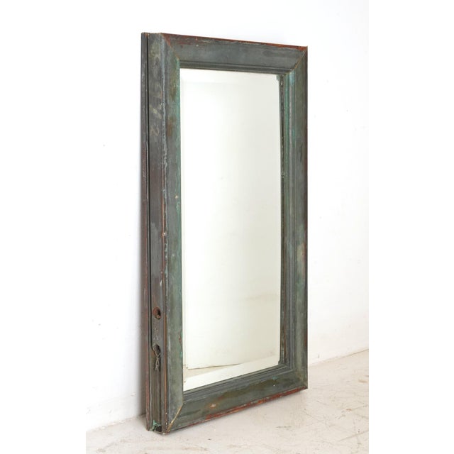 Olde Good Things special design wall mirror with beveled glass. This mirror is made from reclaimed copper window molding...