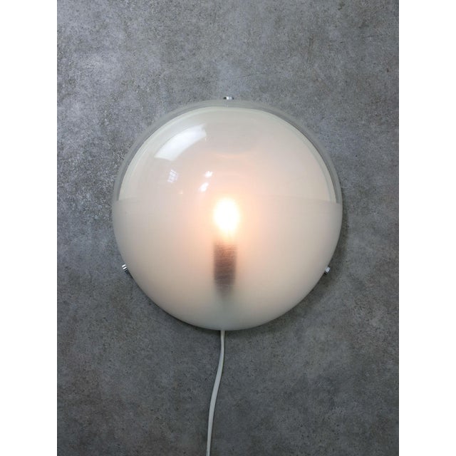 Takes one regular E14 light bulb (not included). Works with 220v as well as 110v. Can be connected into the wall directly...