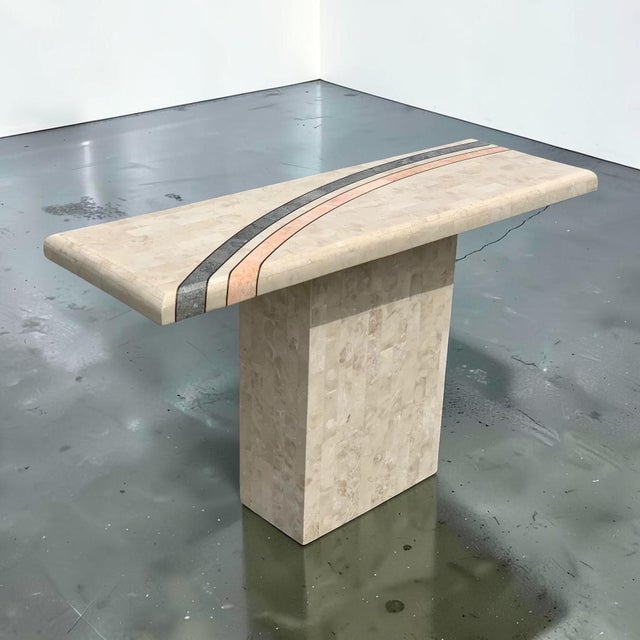 Very elegant Maitland Smith console/entry table. This piece is made of tessellated stone with a nice gray and pink curved...