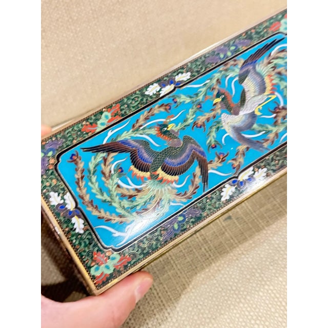 An exceptional and unusually large Japanese cloisonne enamel box, signed Inaba on the underside, dating to the Meiji...