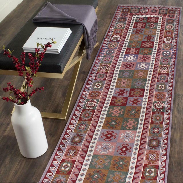Experience the exceptional craftsmanship of this breathtaking Soumak rug, expertly created by skilled master weavers. Made...