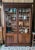Large Louis-Philippe period library in walnut veneer and solid oak. Opening by two glass doors on a set of a total of ten...