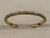 This beautiful 1980s Celery Green Snakeskin Gold Bangle Bracelet will be a subtle yet sophisticated option from day to...