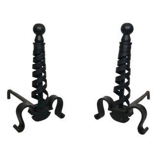 Pair of modernist cast iron andirons. Raymond Subes. For Sale
