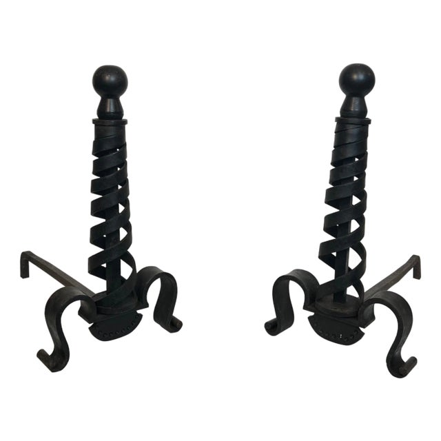 Pair of modernist cast iron andirons. Raymond Subes. For Sale