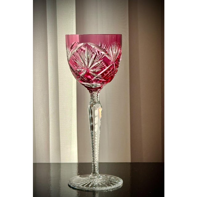 A group of six vintage ruby cut-to-clear crystal hock glasses, comprising five matching examples attributed to Val Saint...