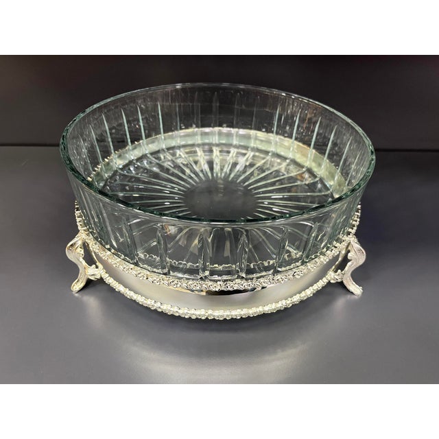 Bring timeless elegance to your table with this handcrafted brass serving bowl, featuring a removable patterned glass...