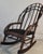 This fine hand made rustic bentwood rocking chair has a suede seat cushion and is in fine condition.It is a very sturdy...