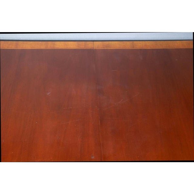 Baker Historic Charleston Collection Mahogany Two Pedestal Dining Table with Satinwood Banding and 1 large leaf. Georgian...